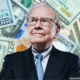 Warren Buffett wearing glasses and suit against a background of US dollar bills